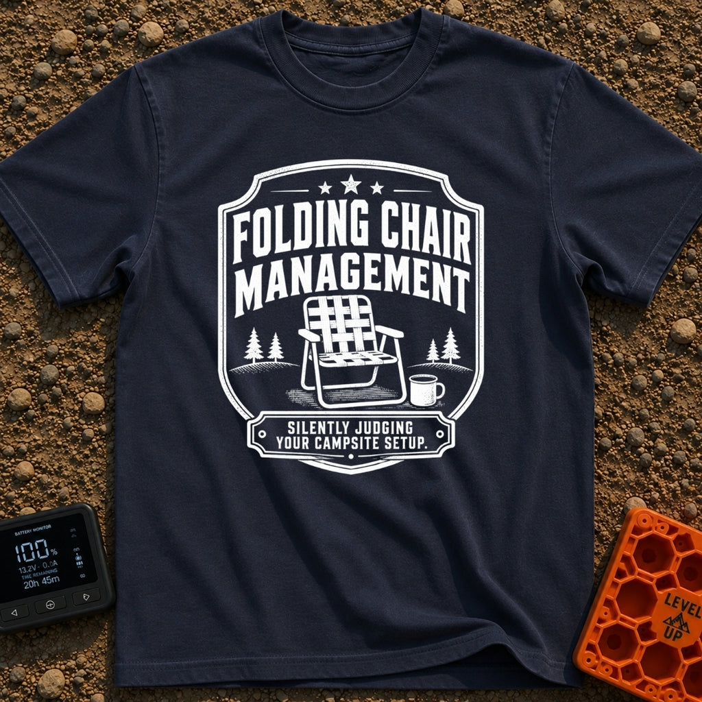 Chief Folding Officer - T-Shirt in Navy - A black-and-white badge graphic featuring a vintage webbed folding camp chair...