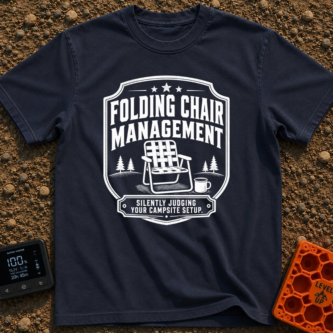 Chief Folding Officer - T-Shirt in Navy - A black-and-white badge graphic featuring a vintage webbed folding camp chair...