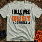 Followed The Wrong Dust - T-Shirt in Bay - A typography-based design featuring the phrase "FOLLOWED THE DUST INCORRECTLY"...