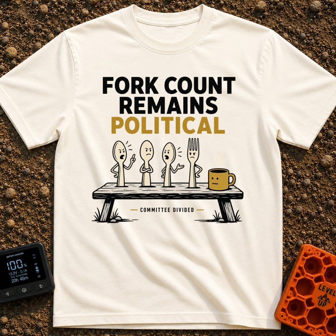Fork Count Politics - T-Shirt in Ivory - A cartoon illustration showing three spoons and one fork with angry expressions...
