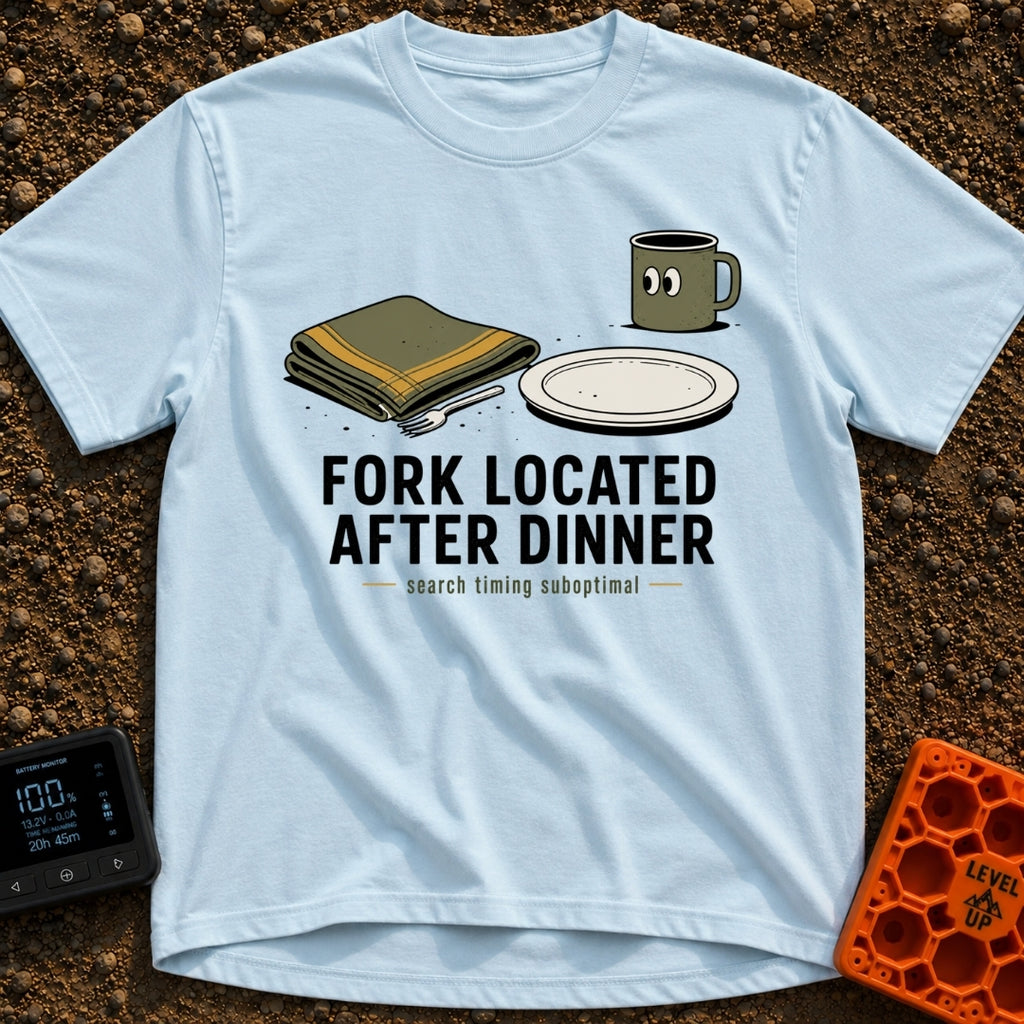 Fork Found Too Late - T-Shirt in Chambray - A cartoon illustration showing a fork partially hidden under a folded green...