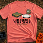 Fork Found Too Late - T-Shirt in Watermelon - A cartoon illustration showing a fork partially hidden under a folded green...