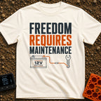 Freedom Under Maintenance - T-Shirt in Ivory - A graphic design with the text "FREEDOM REQUIRES MAINTENANCE" stacked in...