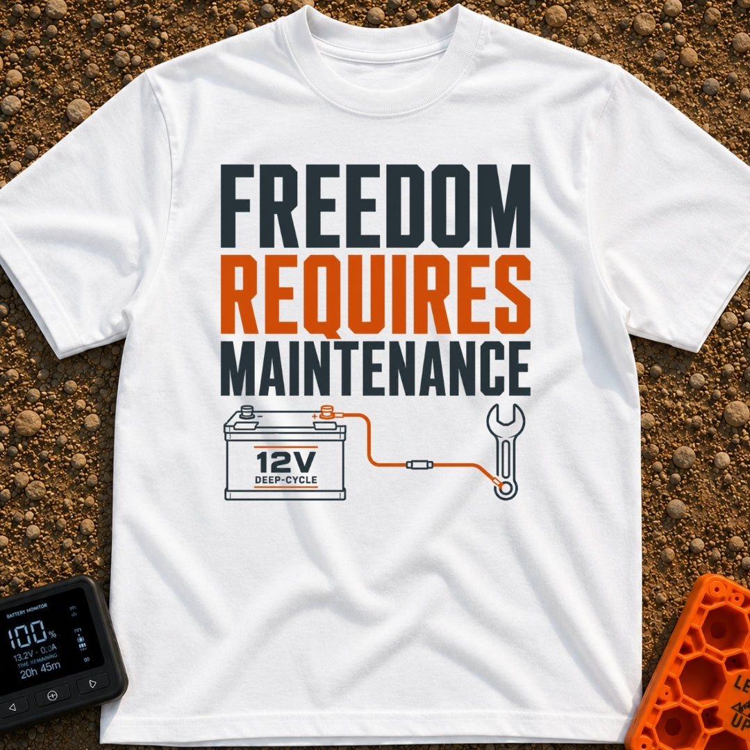 Freedom Under Maintenance - T-Shirt in White - A graphic design with the text "FREEDOM REQUIRES MAINTENANCE" stacked in...