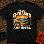 8 Tracks To Amps - T-Shirt in Black - A retro-style illustration showing an 8-track tape and a digital battery monitor...