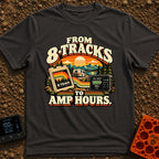 8 Tracks To Amps - T-Shirt in Graphite - A retro-style illustration showing an 8-track tape and a digital battery monitor...