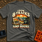 8 Tracks To Amps - T-Shirt in Pepper - A retro-style illustration showing an 8-track tape and a digital battery monitor...