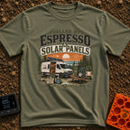 Espresso and Solar - T-Shirt in Moss - A white camper van with a large solar panel angled on its roof is parked in a pine...