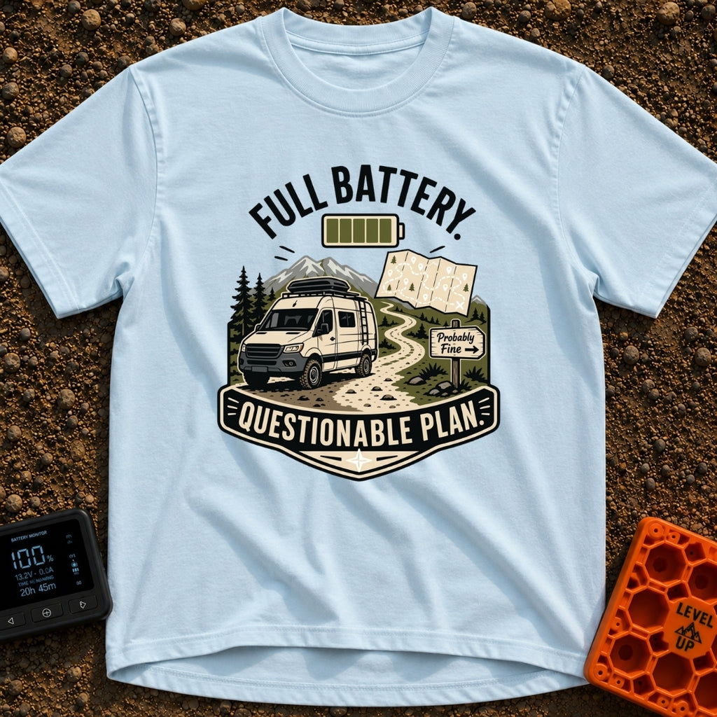 Charged And Questionable - T-Shirt in Chambray - A camper van drives along a winding dirt path through mountains and pine...