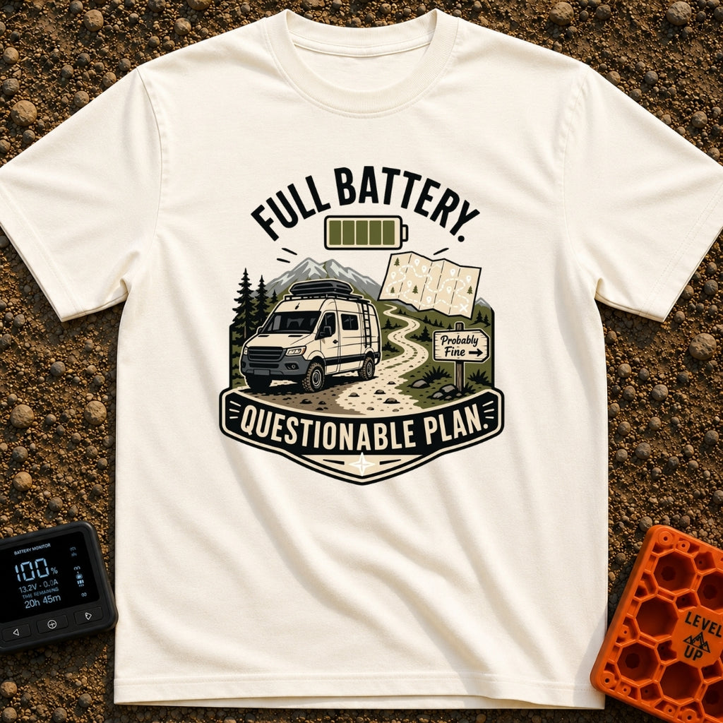 Charged And Questionable - T-Shirt in Ivory - A camper van drives along a winding dirt path through mountains and pine...