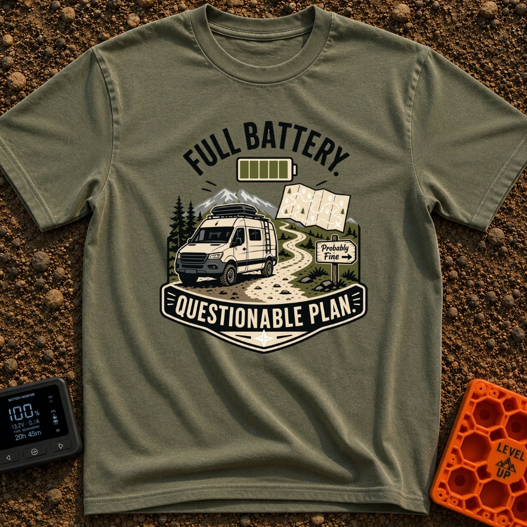 Charged And Questionable - T-Shirt in Moss - A camper van drives along a winding dirt path through mountains and pine...