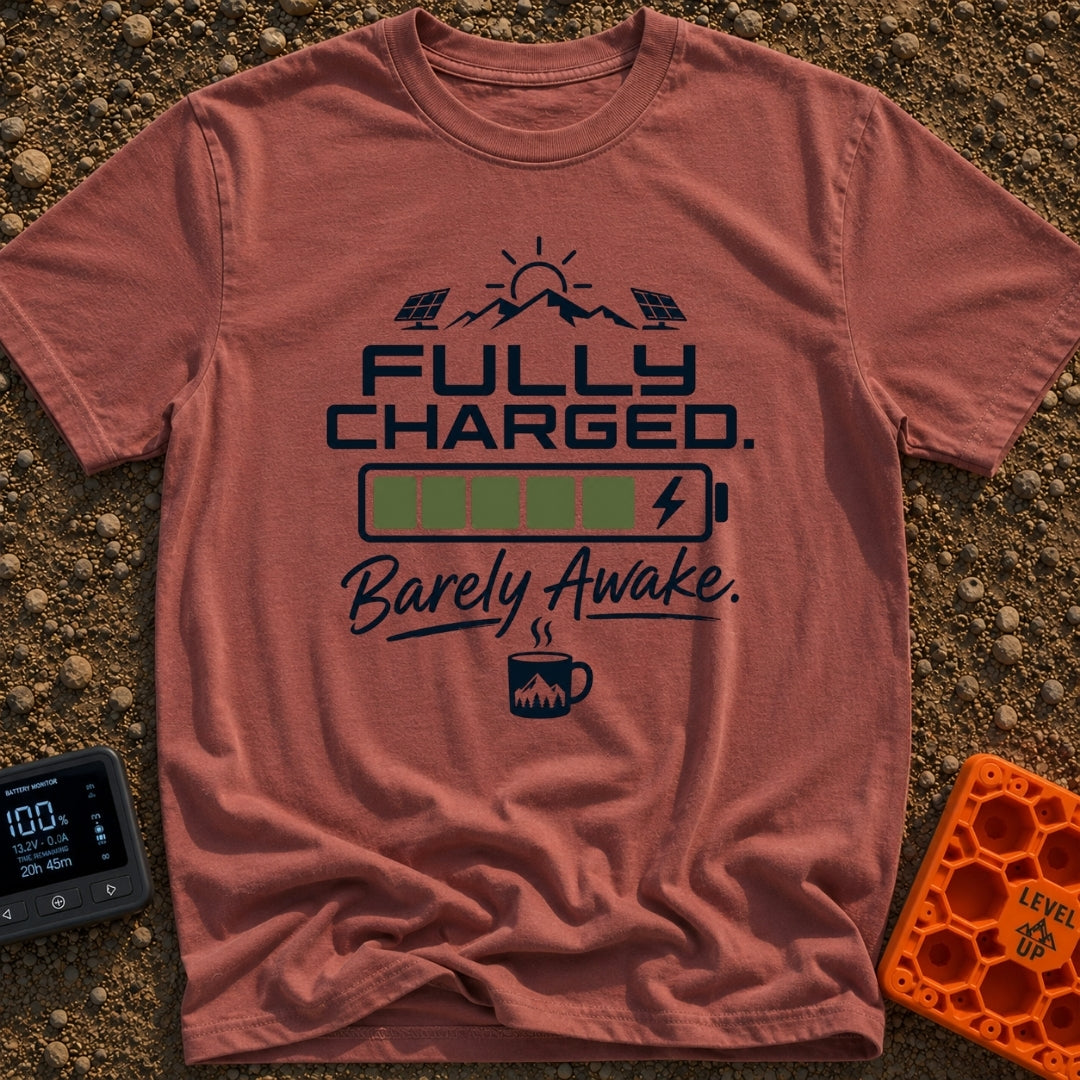 Wired And Tired - T-Shirt in Brick - A graphic featuring a sun over mountains flanked by two solar panels, a full green...
