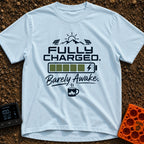 Wired And Tired - T-Shirt in Chambray - A graphic featuring a sun over mountains flanked by two solar panels, a full...