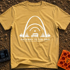 Gateway To The Grid - T-Shirt in Mustard - A black and white illustration of a camper van parked beneath the St. Louis...