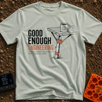 Good Enough Engineering - T-Shirt in Bay - An illustration showing a folding camp table repaired with a wooden branch and...