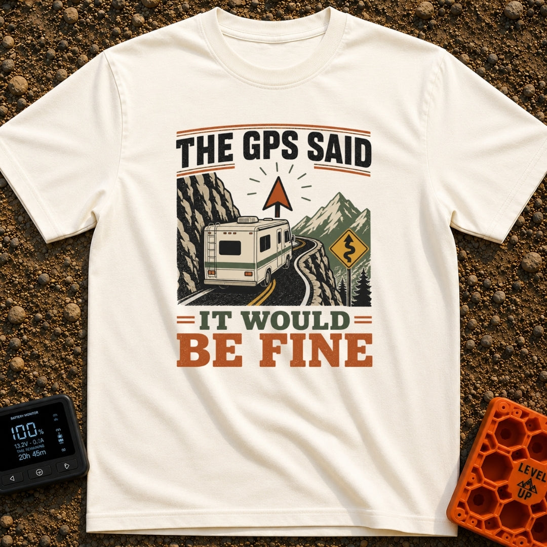 But The GPS Said - T-Shirt in Ivory - A motorhome driving on a narrow, winding mountain road with a steep rock face on...