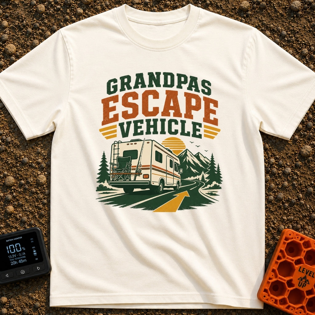 Grandpas Great Escape - T-Shirt in Ivory - A vintage-style Class C motorhome drives away down a winding paved road toward...