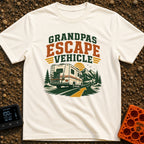 Grandpas Great Escape - T-Shirt in Ivory - A vintage-style Class C motorhome drives away down a winding paved road toward...