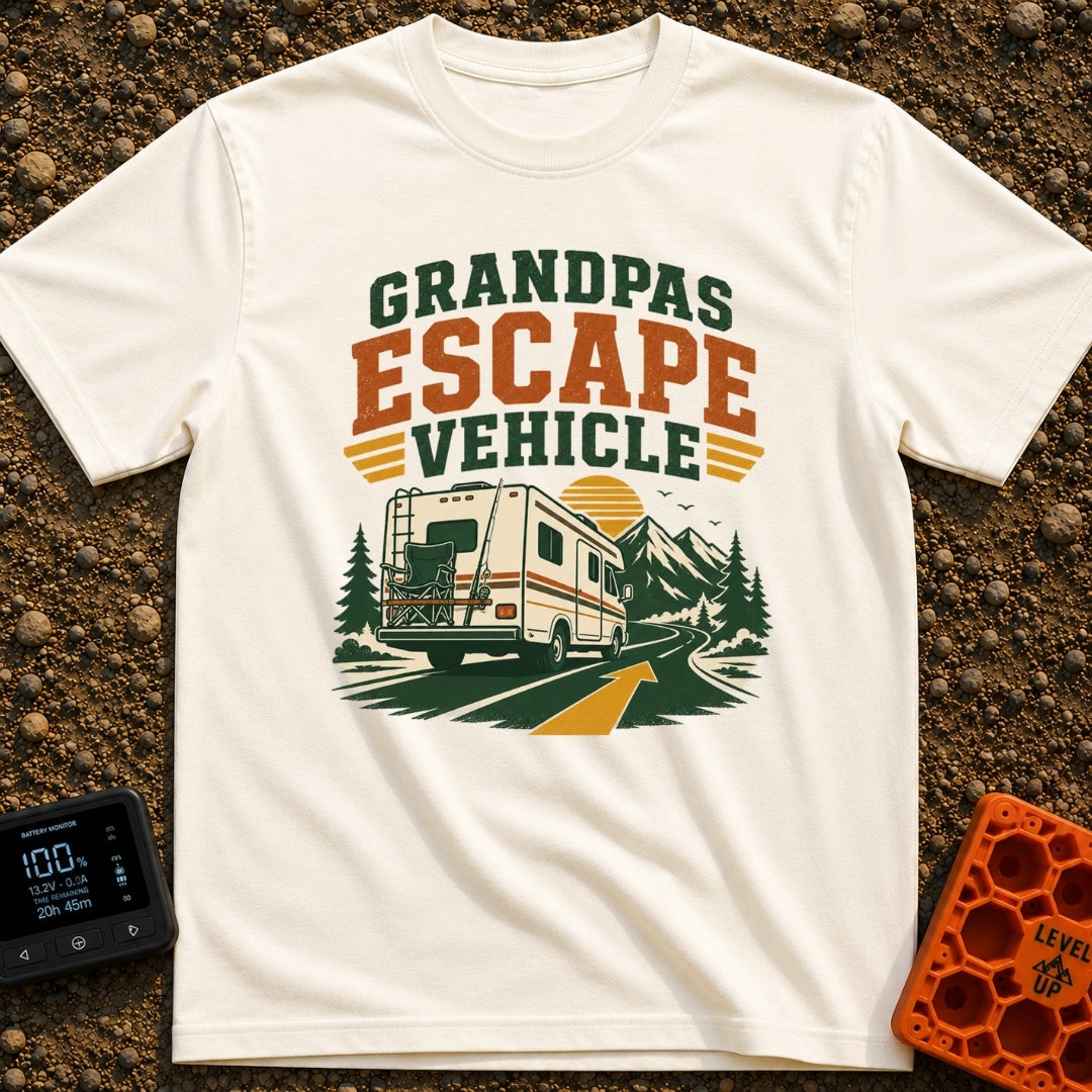 Grandpas Great Escape - T-Shirt in Ivory - A vintage-style Class C motorhome drives away down a winding paved road toward...