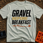 Gravel Before Breakfast - T-Shirt in Bay - A typographic design reading "GRAVEL BEFORE BREAKFAST" in bold letters, with a...