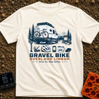 Gravel Travel Linkup - T-Shirt in Ivory - An illustration of a white camper van with a rear-mounted bicycle parked on a...