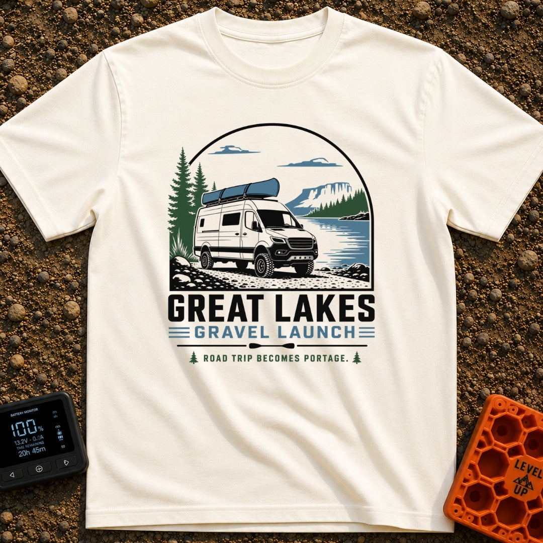 Canoe Venture Vibes - T-Shirt in Ivory - A white camper van with a blue canoe strapped to its roof is parked on a gravel...