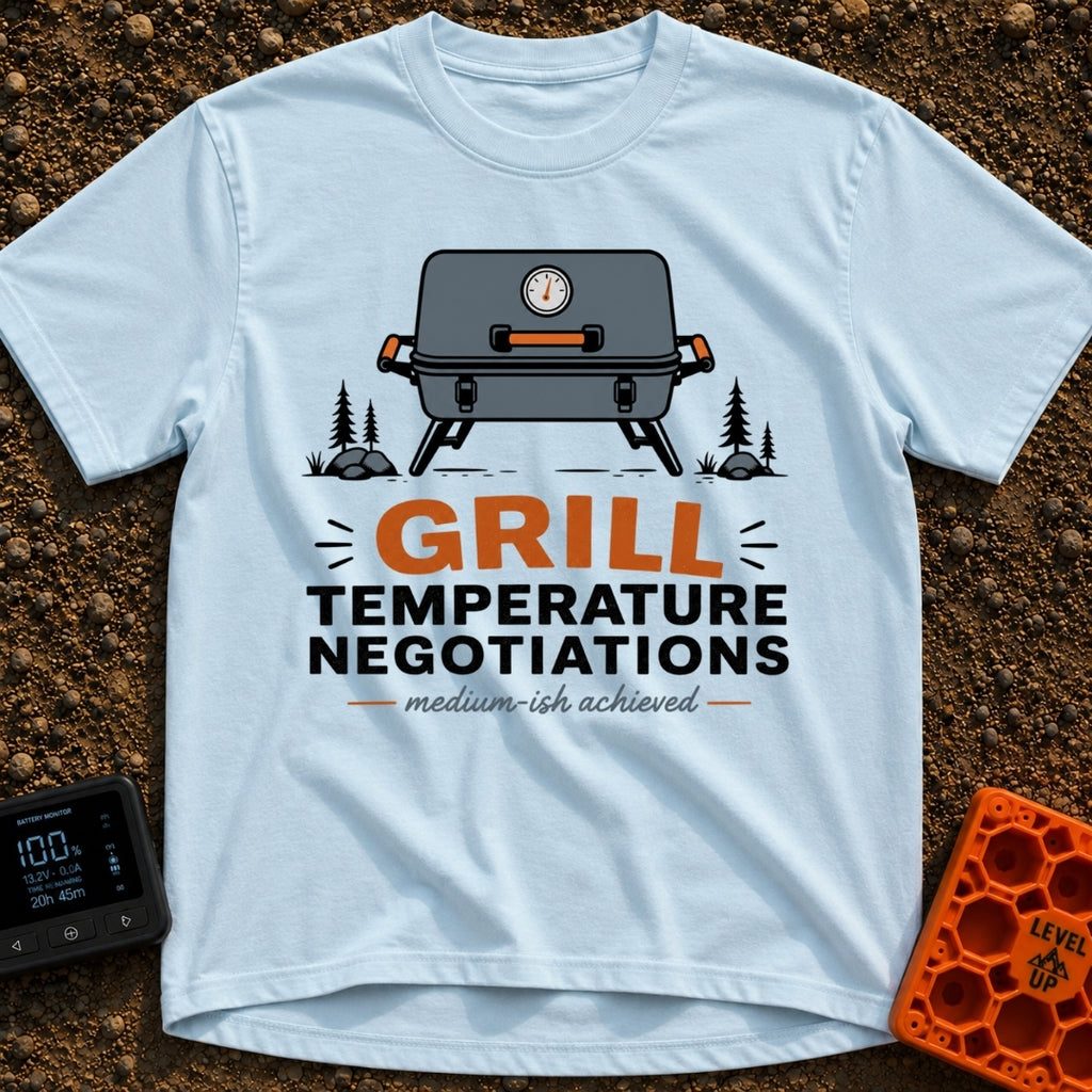 Heated Grill Negotiations - T-Shirt in Chambray - An illustration of a grey portable camping grill with a temperature...