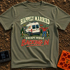 Happily Hitched Campers - T-Shirt in Moss - A cartoon illustration of a campervan backing into a wooded campsite between...