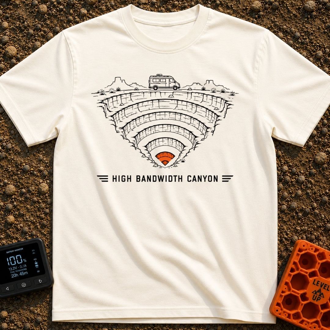 Canyon Wide Web - T-Shirt in Ivory - A black-and-white line drawing of a camper van parked on the rim of a deep, terraced...