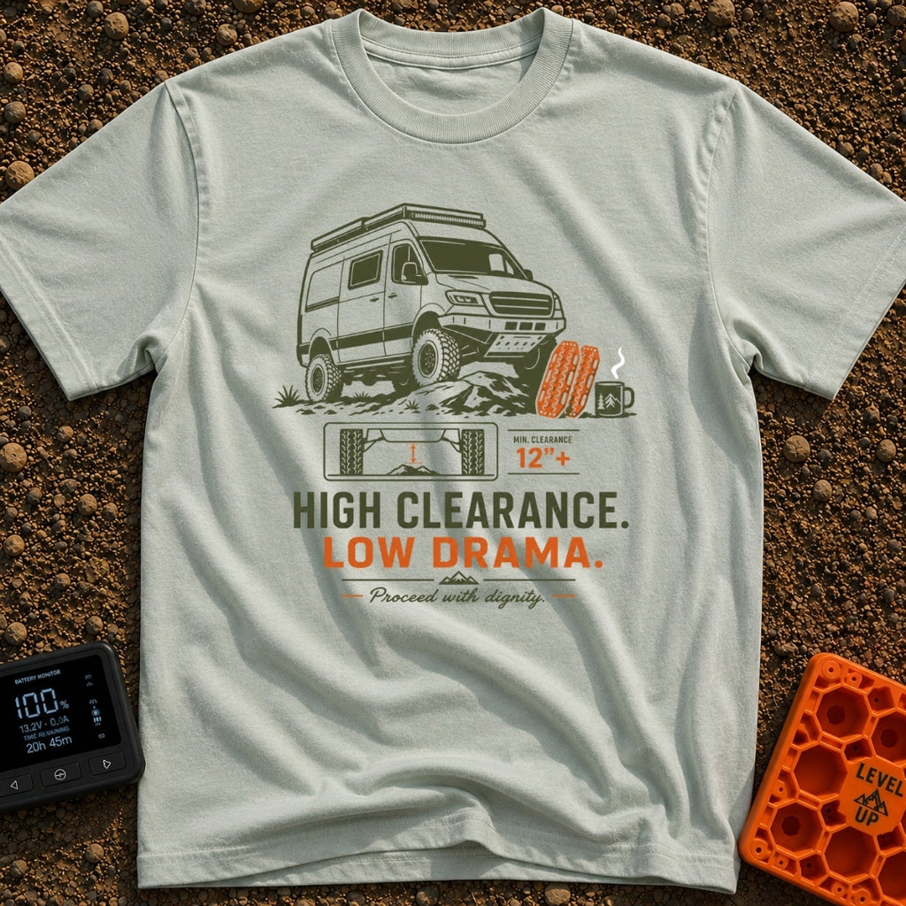 High Clearance Low Drama - T-Shirt in Bay - A lifted camper van is shown driving over rocks next to two orange vehicle...