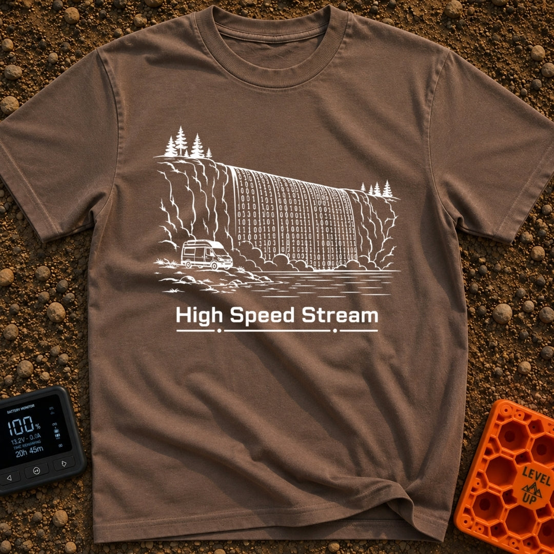 Off Grid Streaming - T-Shirt in Espresso - A black and white line drawing of a camper van parked beside water, with a...