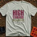 High Standards Happy Paws - T-Shirt in Bay - A typography design reading "HIGH STANDARDS HAPPY PAWS" with the text...