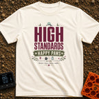 High Standards Happy Paws - T-Shirt in Ivory - A typography design reading "HIGH STANDARDS HAPPY PAWS" with the text...