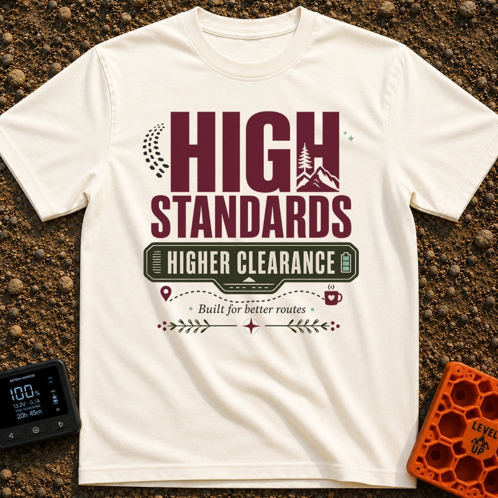 Elevated Adventure Standards - T-Shirt in Ivory - A typographic design featuring the text "HIGH STANDARDS HIGHER...