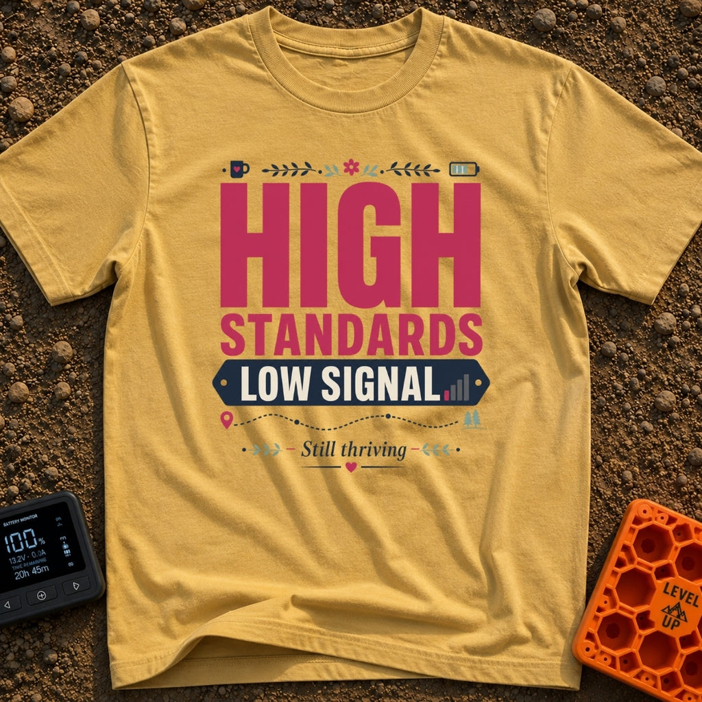 Standards And Signals - T-Shirt in Mustard - A typographic design reading "HIGH STANDARDS LOW SIGNAL" and "Still...
