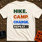 Hike Camp Charge Repeat - T-Shirt in Ivory - A typographic design stacking the words "HIKE.", "CAMP.", "CHARGE.", and...