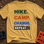 Hike Camp Charge Repeat - T-Shirt in Mustard - A typographic design stacking the words "HIKE.", "CAMP.", "CHARGE.", and...