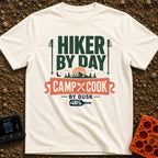 From Trail To Table - T-Shirt in Ivory - Typographic design reading "Hiker By Day Camp Cook By Dusk" featuring two hiking...