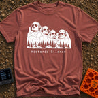 Sound of Historic Silence - T-Shirt in Brick - A black and white illustration of the Mount Rushmore presidents wearing...