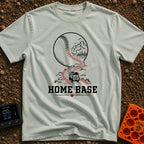 Mobile Home Base - T-Shirt in Bay - A line-art illustration of a camper van driving along a winding dirt road that morphs...