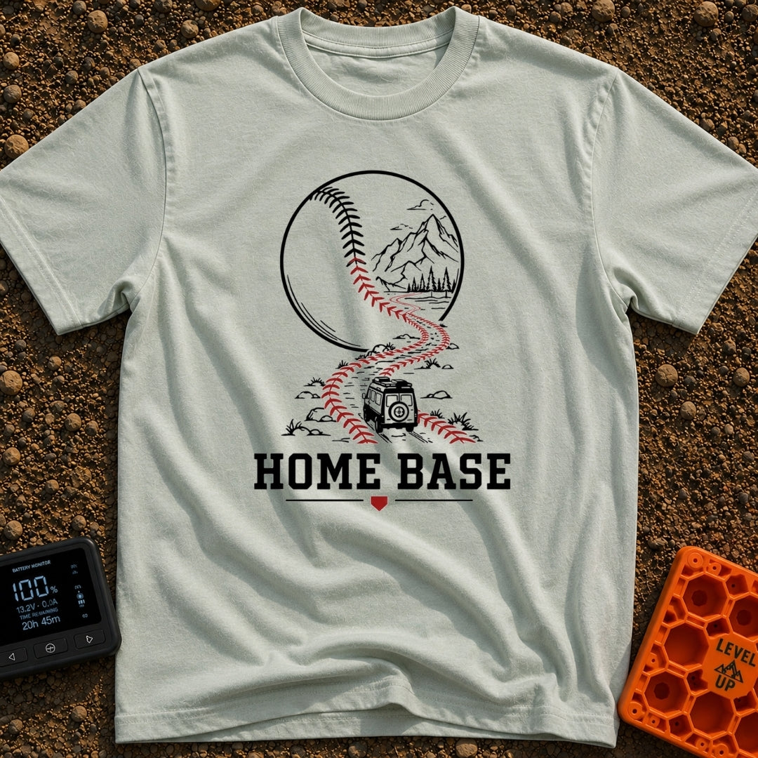 Mobile Home Base - T-Shirt in Bay - A line-art illustration of a camper van driving along a winding dirt road that morphs...