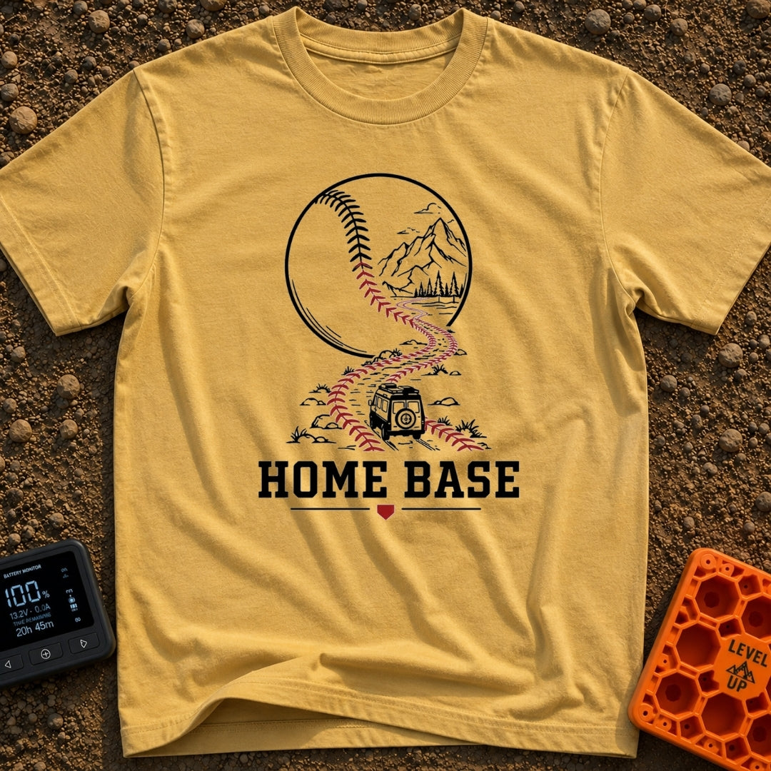 Mobile Home Base - T-Shirt in Mustard - A line-art illustration of a camper van driving along a winding dirt road that...