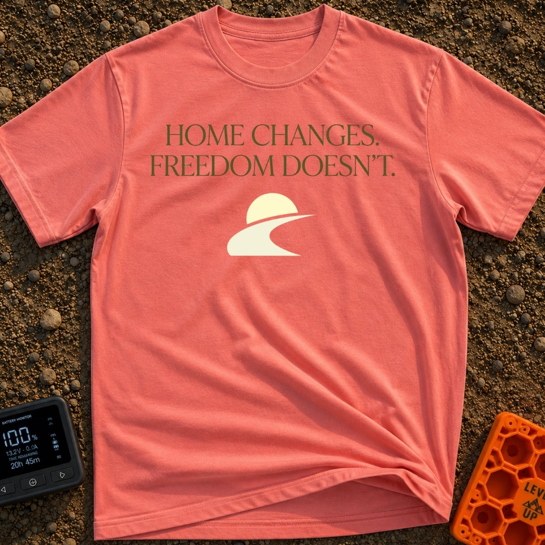 Home Moves Freedom Stays - T-Shirt in Watermelon - Text reading "HOME CHANGES. FREEDOM DOESN'T." in olive green serif...
