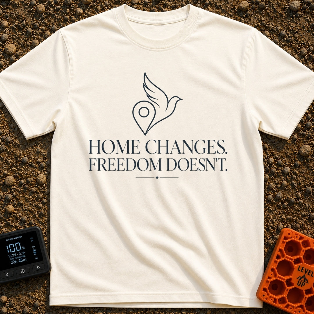 Same Freedom New Views - T-Shirt in Ivory - A minimalist line-art graphic of a map location pin merging into the wing and...