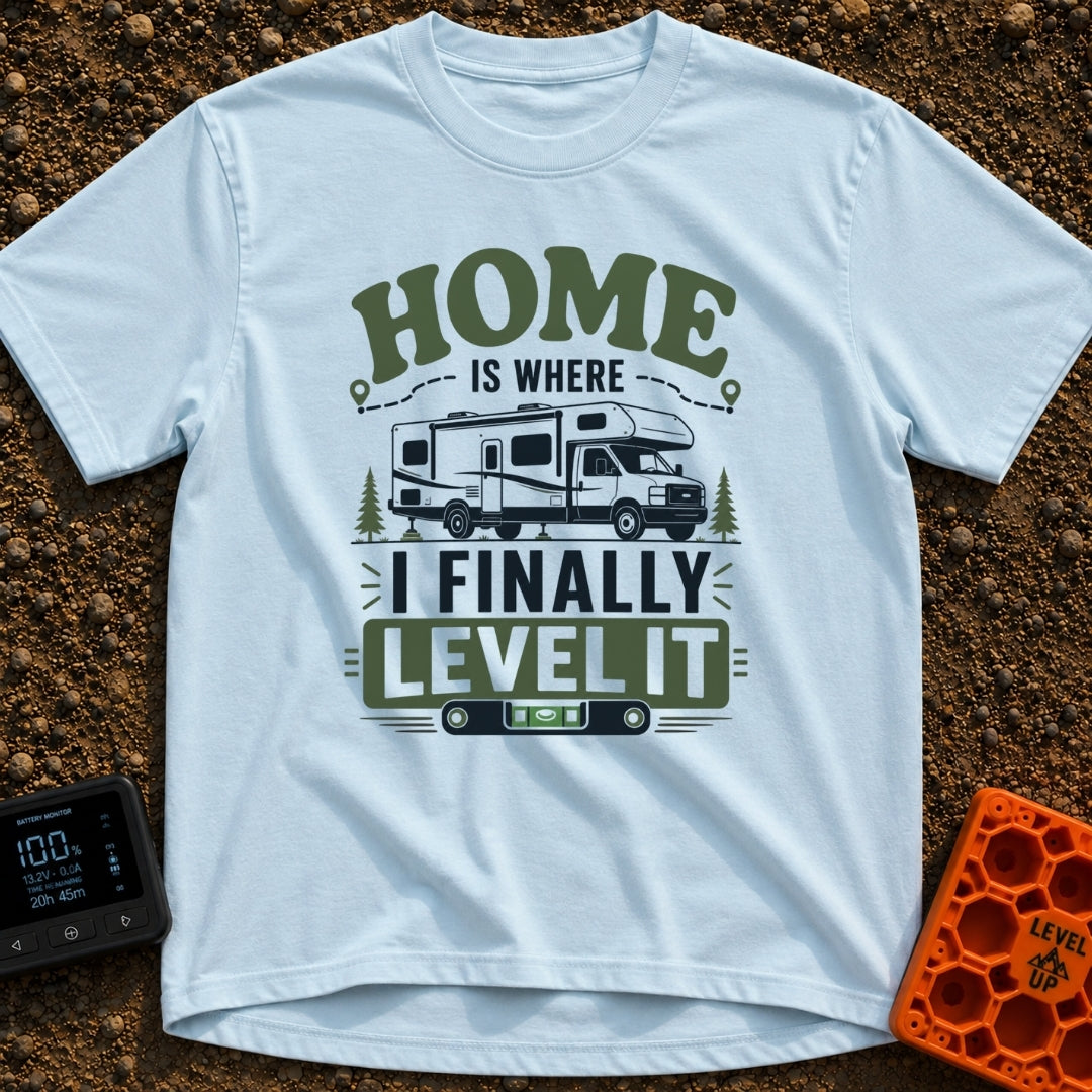 Home Is Finally Level - T-Shirt in Chambray - The artwork features a Class C motorhome parked on leveling blocks between...