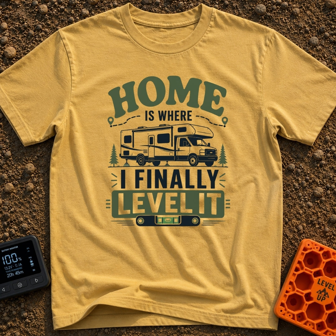 Home Is Finally Level - T-Shirt in Mustard - The artwork features a Class C motorhome parked on leveling blocks between...