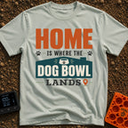 Where Dog Bowl Lands - T-Shirt in Bay - Typographic design reading "HOME IS WHERE THE DOG BOWL LANDS" featuring graphic...