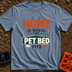 Where The Pet Fits - T-Shirt in Blue Jean - A typographic design reading "HOME IS WHERE THE PET BED FITS" featuring paw...