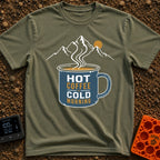 Hot Coffee Cold Morning - T-Shirt in Moss - A graphic of a blue enamel camp mug filled with steaming coffee, featuring...