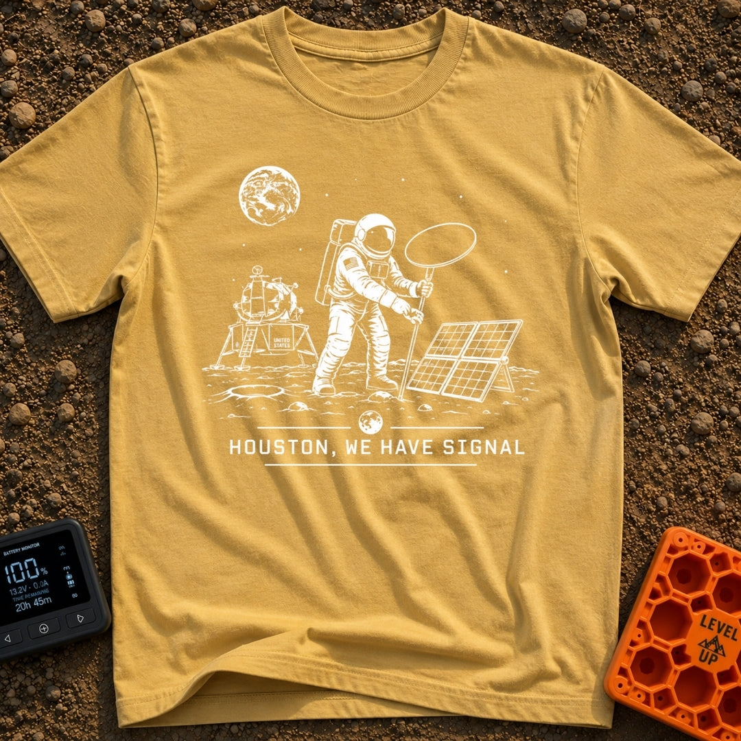 Houston We Have Bars - T-Shirt in Mustard - A black and white line-art illustration of an astronaut on the moon holding...
